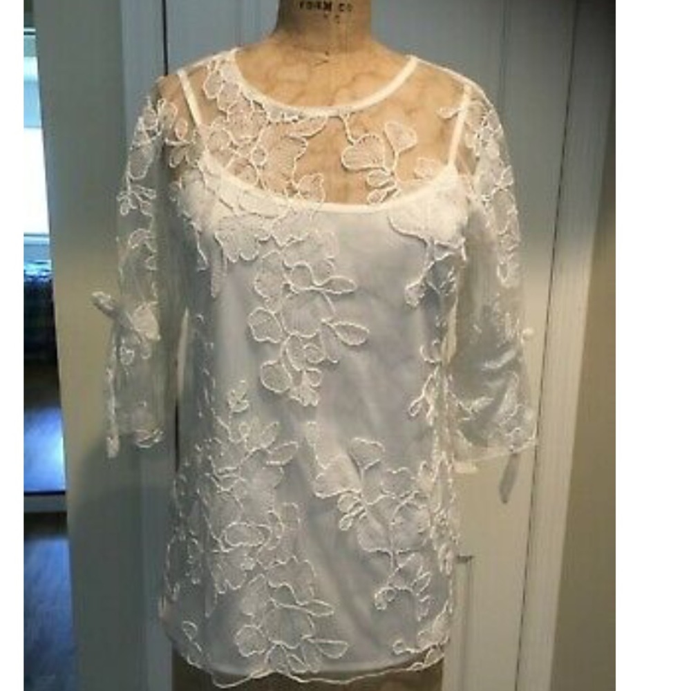 Eva Franco Anthropologie embroidered cream top M